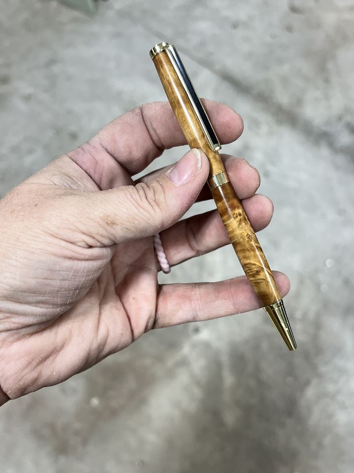 Honey colored burl wood pen with gold hardware